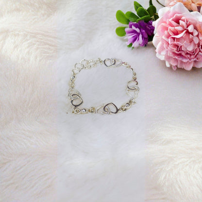 Pulsera Corazones Entrelazados en Plata