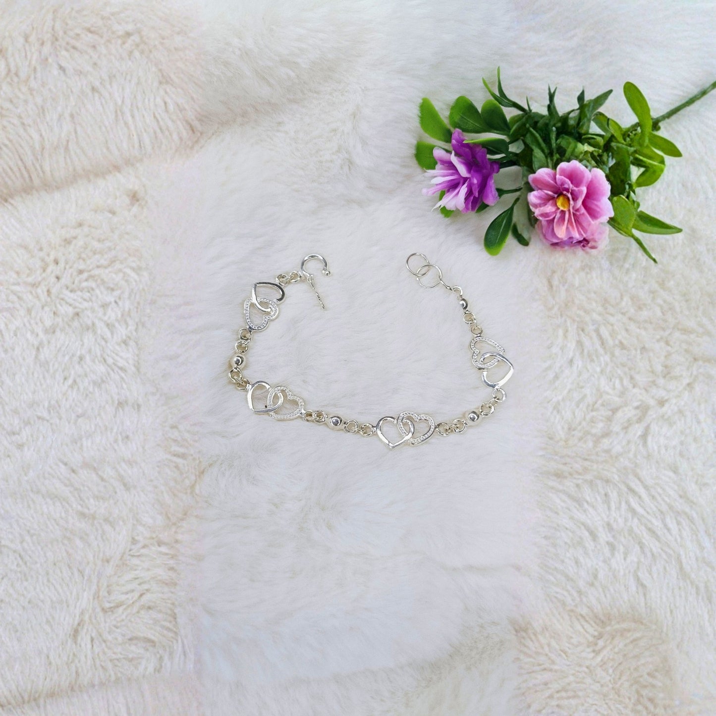 Pulsera Corazones Entrelazados en Plata