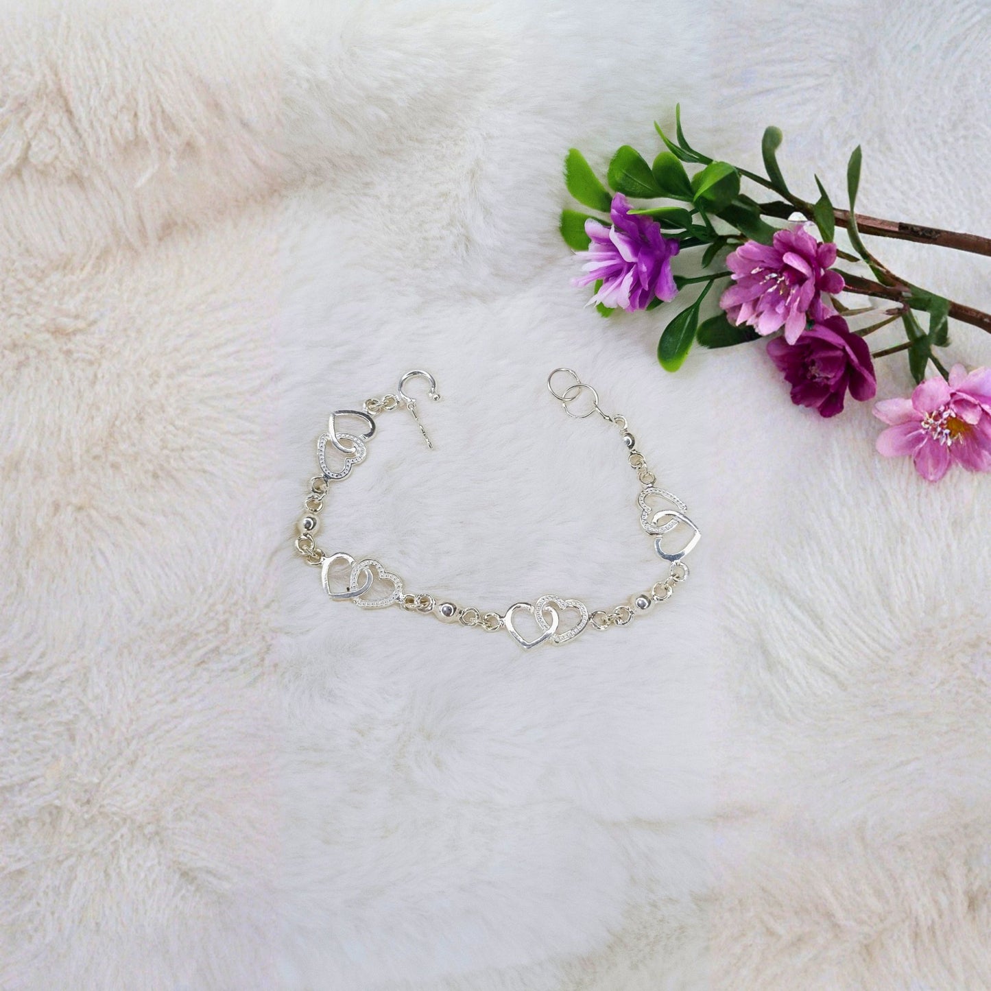 Pulsera Corazones Entrelazados en Plata