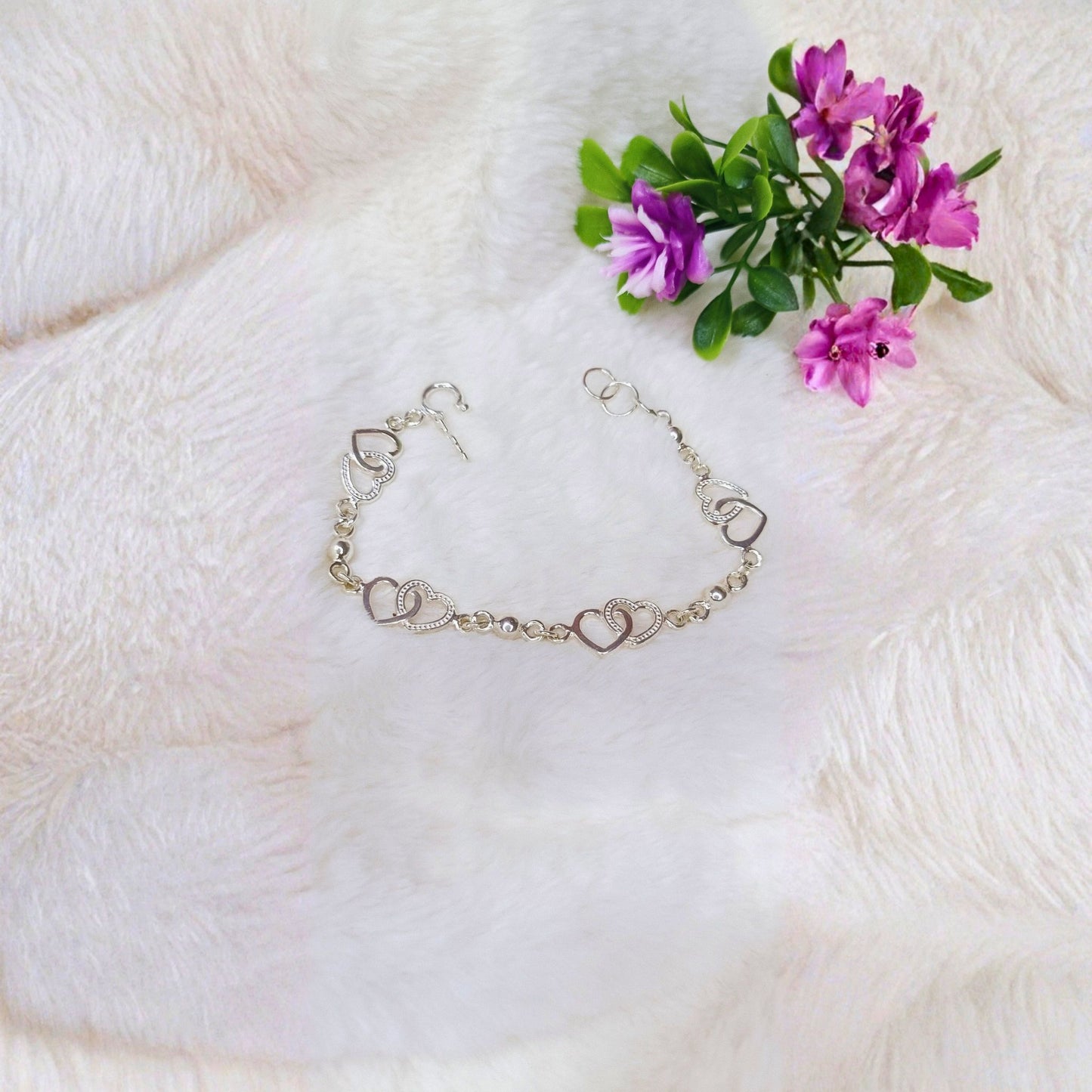 Pulsera Corazones Entrelazados en Plata