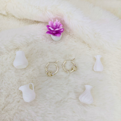 Aretes Aros con Nudo Texturizado en Plata