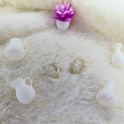 Aretes Aros con Nudo Texturizado en Plata