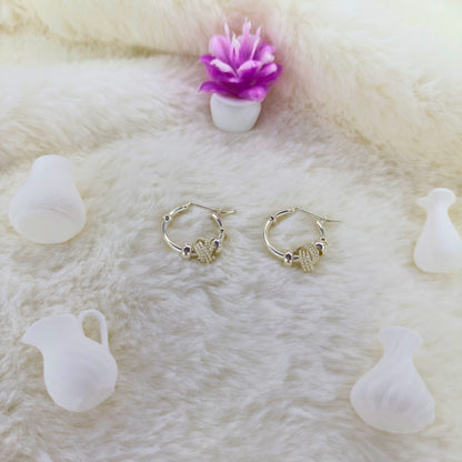 Aretes Aros con Nudo Texturizado en Plata