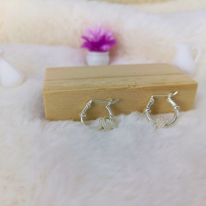 Aretes Aros con Nudo Texturizado en Plata